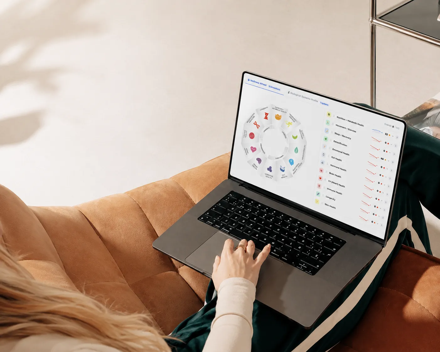 Person reviewing their Health Nexus biomarker dashboard on a laptop