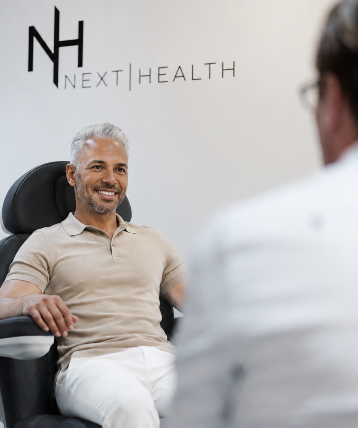 Next Health physician reviewing an Apex longevity plan with a patient