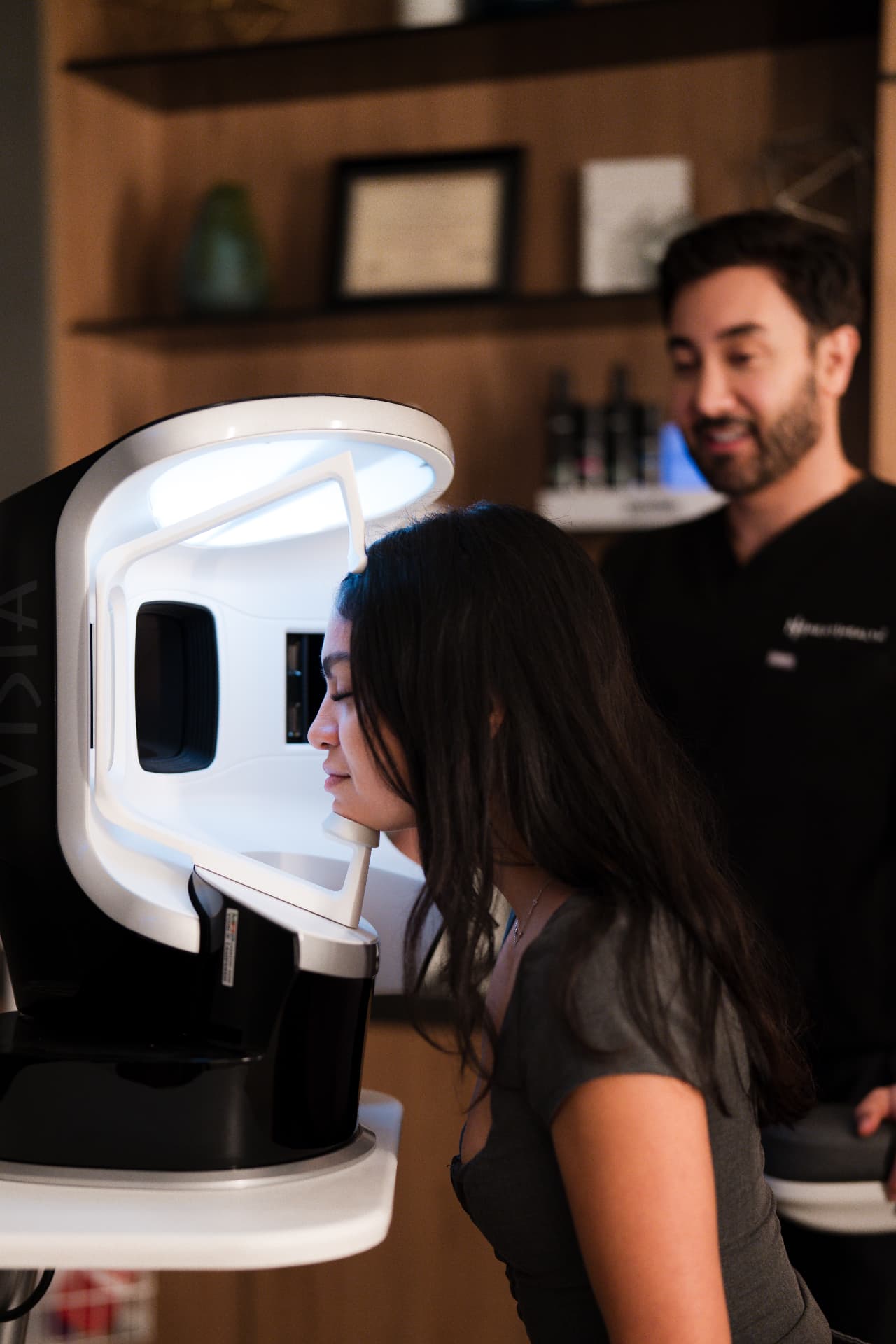 Dr. Darshan Shah with an aesthetics patient at Next Health
