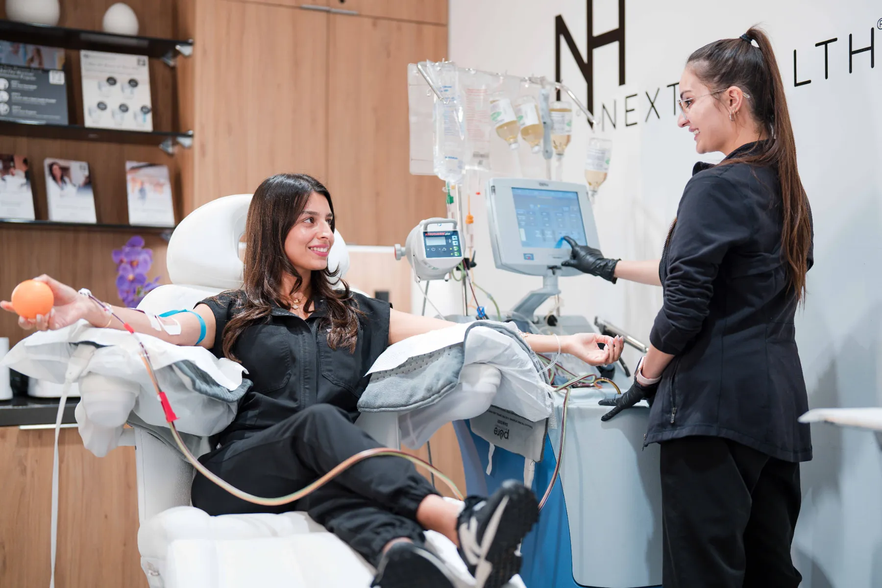 Patient receiving Therapeutic Plasma Exchange in a Next Health treatment suite